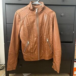 Guess brown leather jacket with zipper pockets and logo lining. Size M